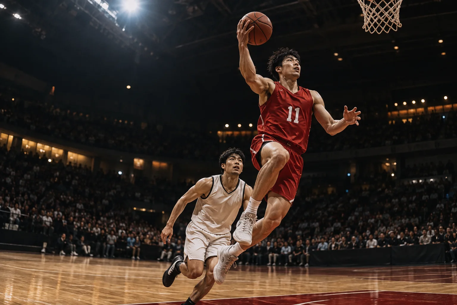 赤いユニフォームの選手が、ゴールへ向かって跳び上がる瞬間